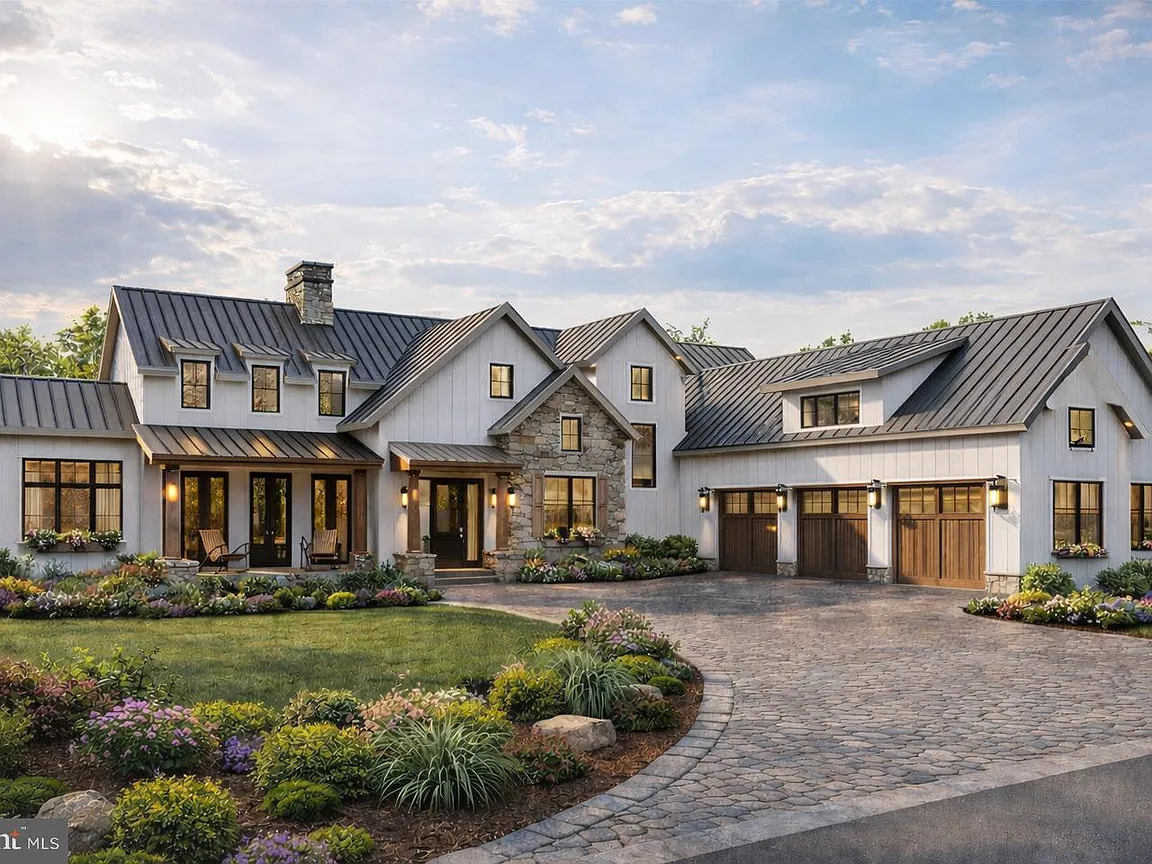 Elegant Lancaster County estate home with lush landscaping, stone accents and manicured gardens